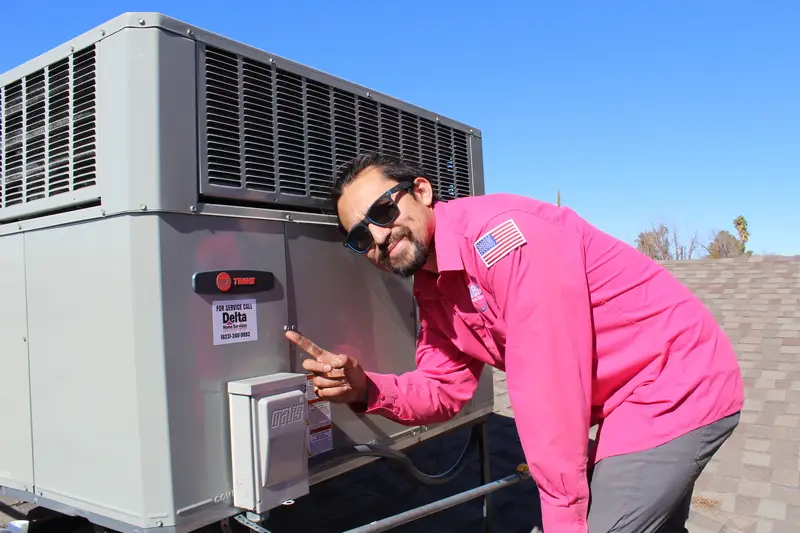 Delta Home Services AC installation technician